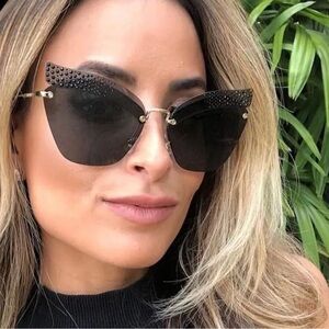 Miu Miu Black Cat-Eye Sunglasses with Rhinestone Accents
